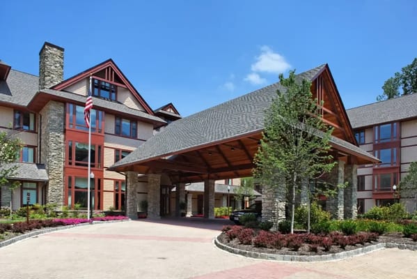 Exterior view of Fox Hill Residences with landscaped entrance