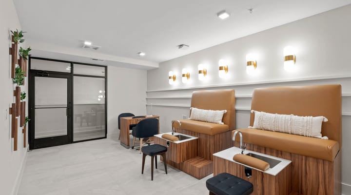 Interior view of a calming nail salon area