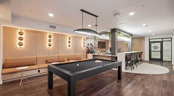 Interior common area with seating and a pool table