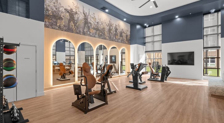 Well-equipped fitness room with exercise machines