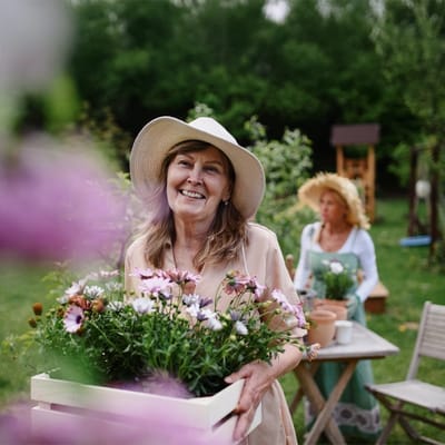 Residents gardening in a vibrant outdoor space