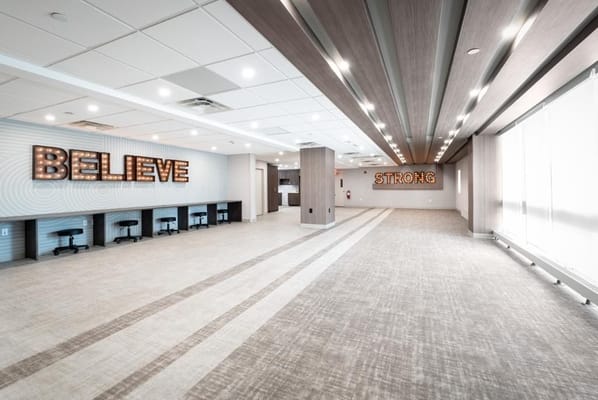 A spacious common area with motivational signs