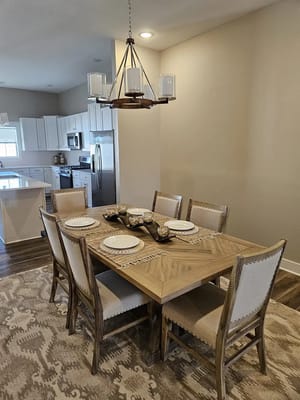 Dining area with a wooden table and chairs