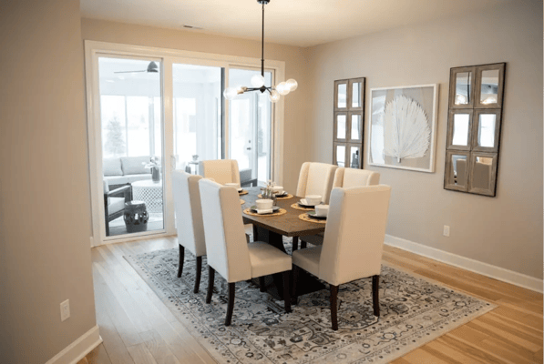 Bright dining room setup with a large table and chairs