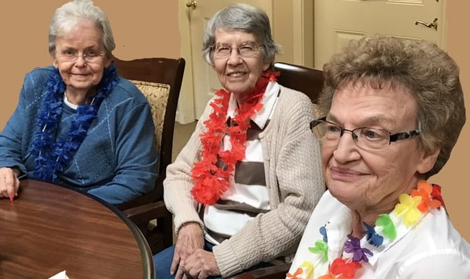 Residents enjoying a festive gathering in a common area