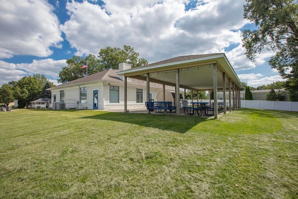 Exterior view of a building and outdoor seating area