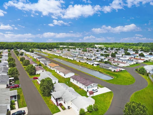 Aerial view of a residential community with greenery