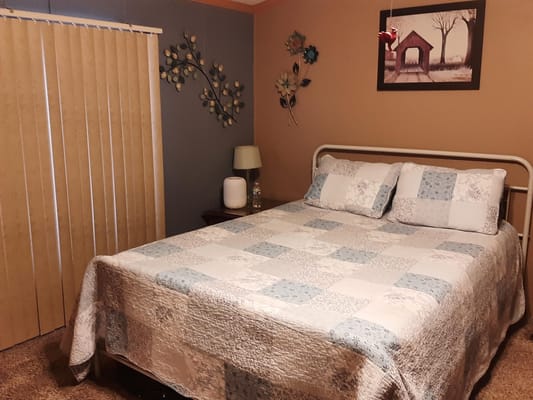 Cozy private resident room with a bed and decor