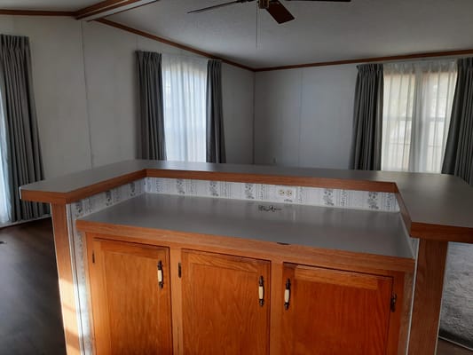 Bright interior view of a common area with counter