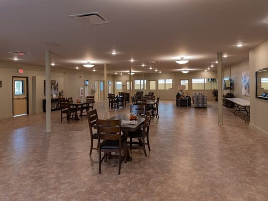 Interior view of a dining area with tables and chairs