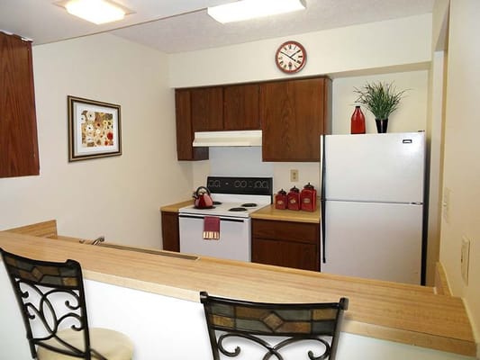 Cozy kitchen area with appliances and decor