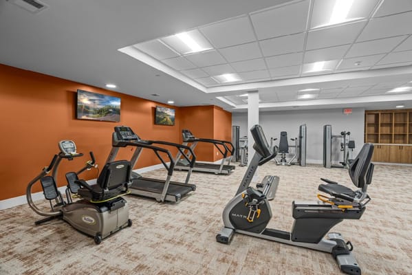 Interior view of a fitness room with exercise equipment