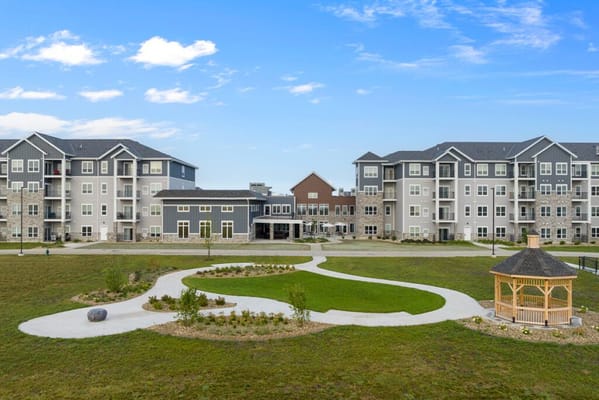 Exterior view of HallMar Village with landscaped grounds
