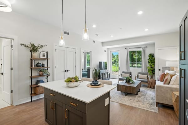Bright and inviting common living space in Aura Independent Living