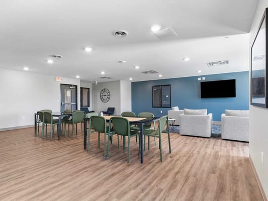 Modern common area with tables and seating