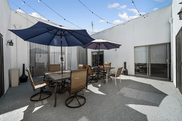 Patio area with tables and umbrellas