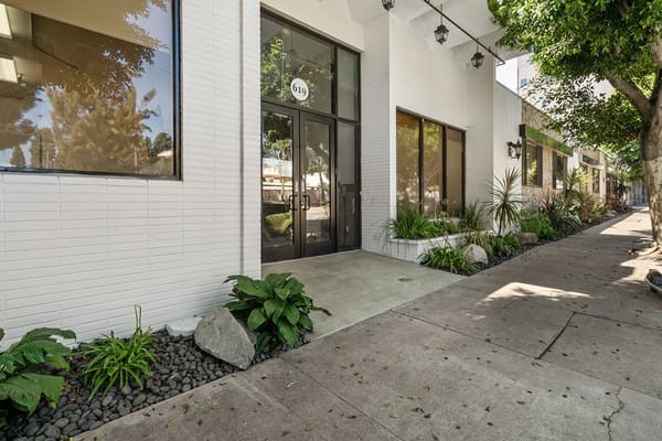Entrance of Kennedy Care Center with outdoor plants