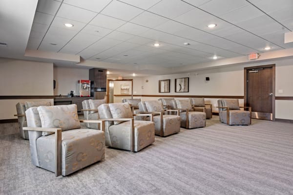 Common area with seating in a bright room