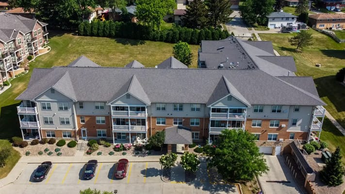 Aerial view of Brookside I senior living facility showing building and parking area.