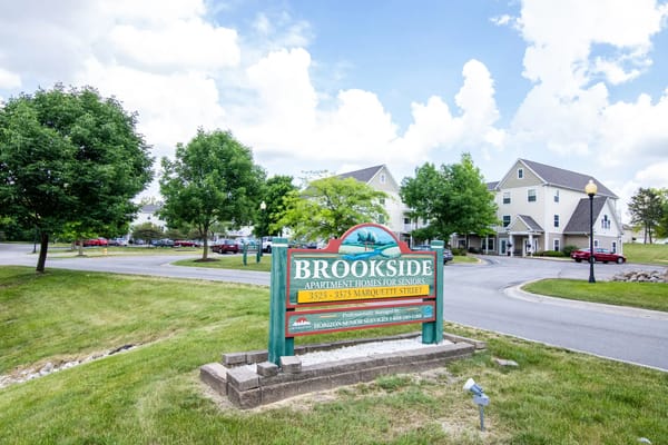Sign for Brookside Apartments for Seniors at the entrance