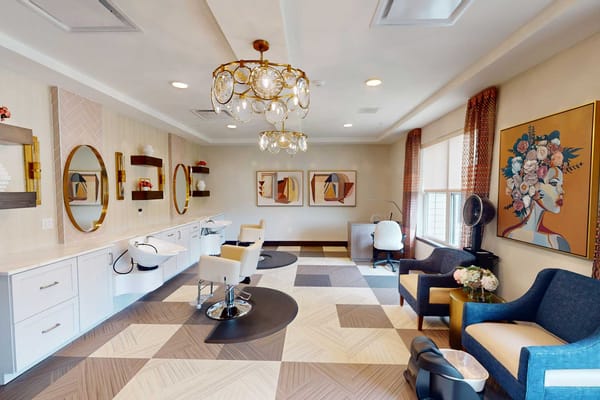 Bright beauty salon with stylish decor and seating