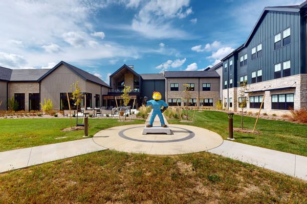 Outdoor courtyard view with colorful sculpture