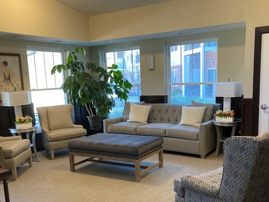 Spacious living room with comfortable seating and natural light