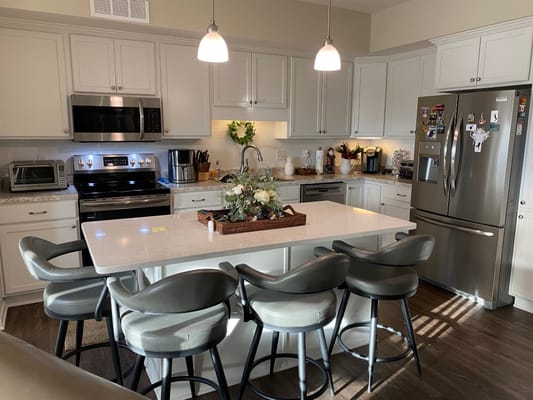 Bright and modern kitchen with seating area