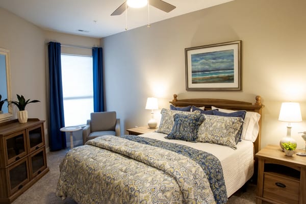 Cozy, well-furnished resident room with natural light