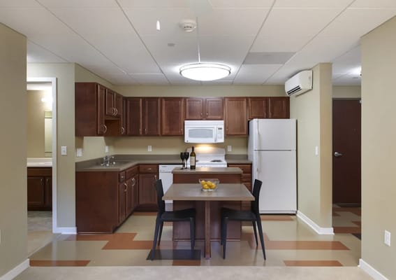 Bright interior view of a kitchen and dining area