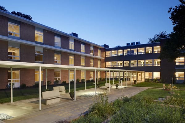 Exterior view of Crestview Terrace Apartments at dusk