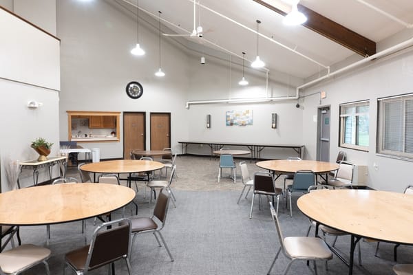 Interior view of a common area with tables