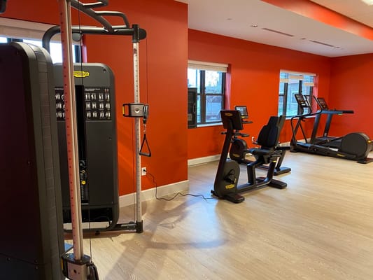 Interior view of a fitness area with exercise equipment