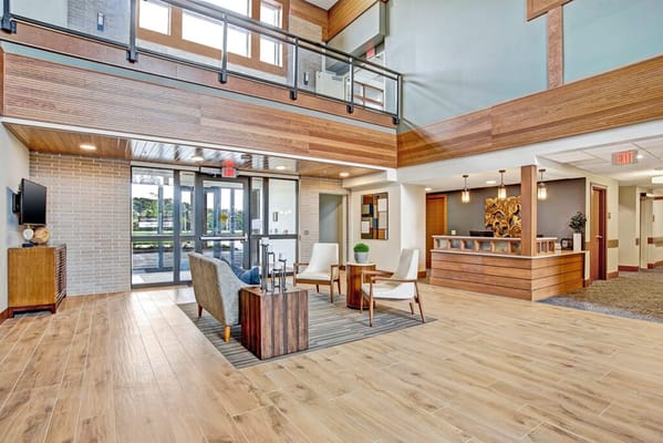 Welcoming lobby with seating and reception area at Prairie Gate
