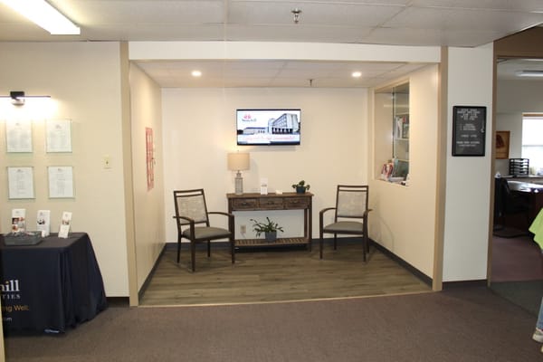 Interior view of a common area with seating.