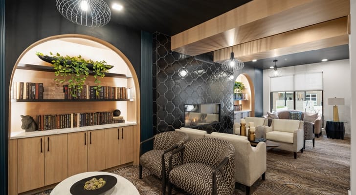 Cozy common area with seating and bookshelves