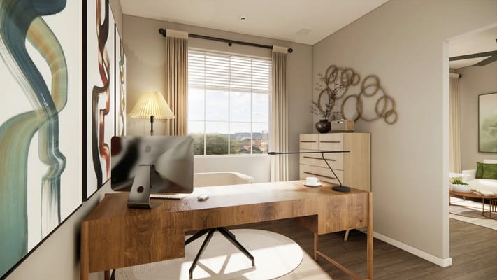 Modern office space with a wooden desk and computer