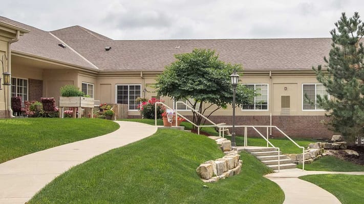 Pathway leading to the entrance of a senior living facility