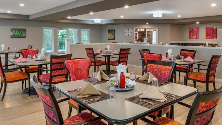 Bright dining area with colorful decor and tables