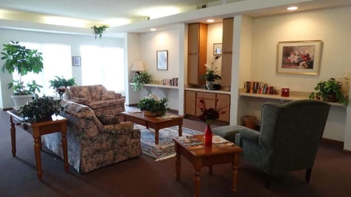 Comfortable common area with seating and plants