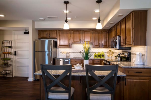 Modern kitchen interior with dining area