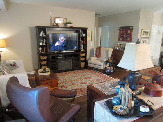 Cozy common area with seating and a television