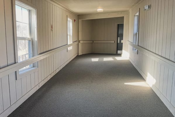 Bright interior hallway in a senior living facility