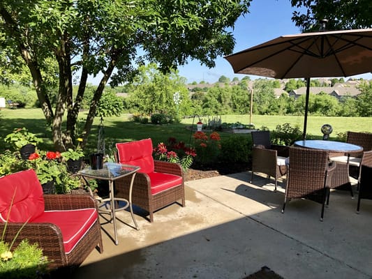 Seating area with garden view in a senior living facility