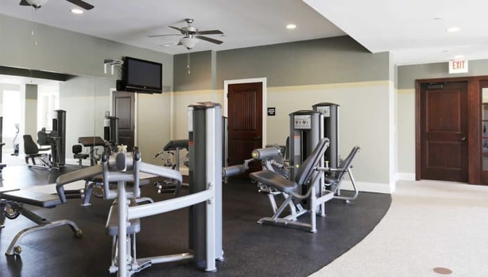 Interior view of a fitness room with exercise equipment