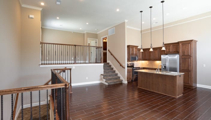 Spacious living area with modern kitchen