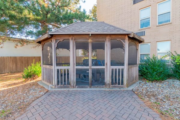 Outdoor gazebo in a landscaped area