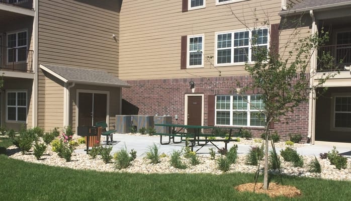 Outdoor space with seating and greenery at Birchwood Villas