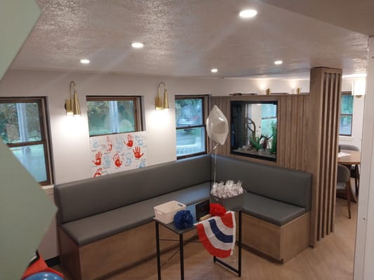 Bright interior common area with seating and decor