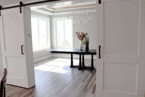 Bright interior view of a room with large windows
